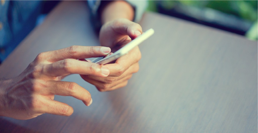 A person using a mobile phone